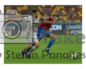 Risto Radunovic de la FCSB in duel pentru balon cu un jucator de la FC Botosani in meciul FCSB – FC Botosani pe Arena Nationala din Bucuresti, 5 februarie 2026